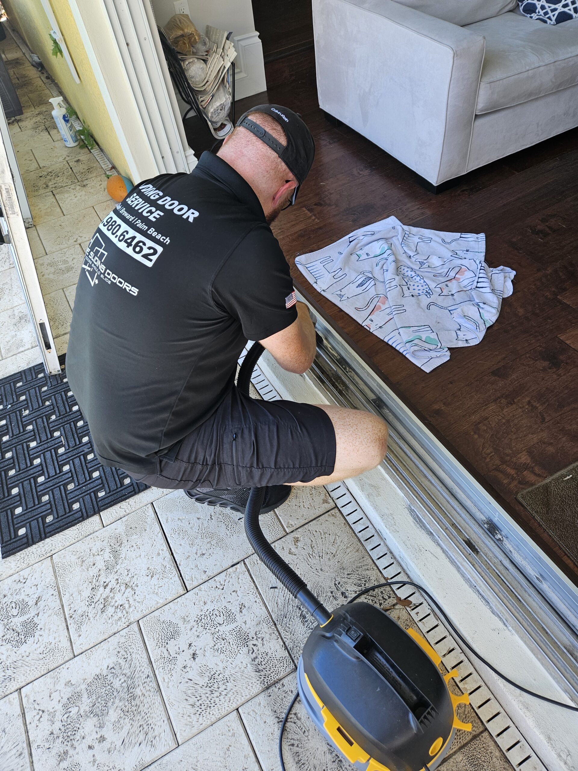 Sliding door maintenance expert cleaning tracks for smoother operation near me