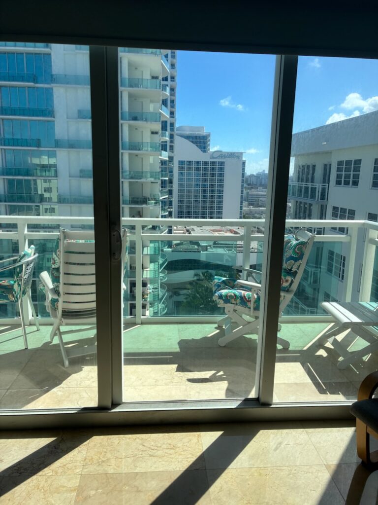 Patio sliding glass door that is hard to open due to worn rollers or dirty tracks